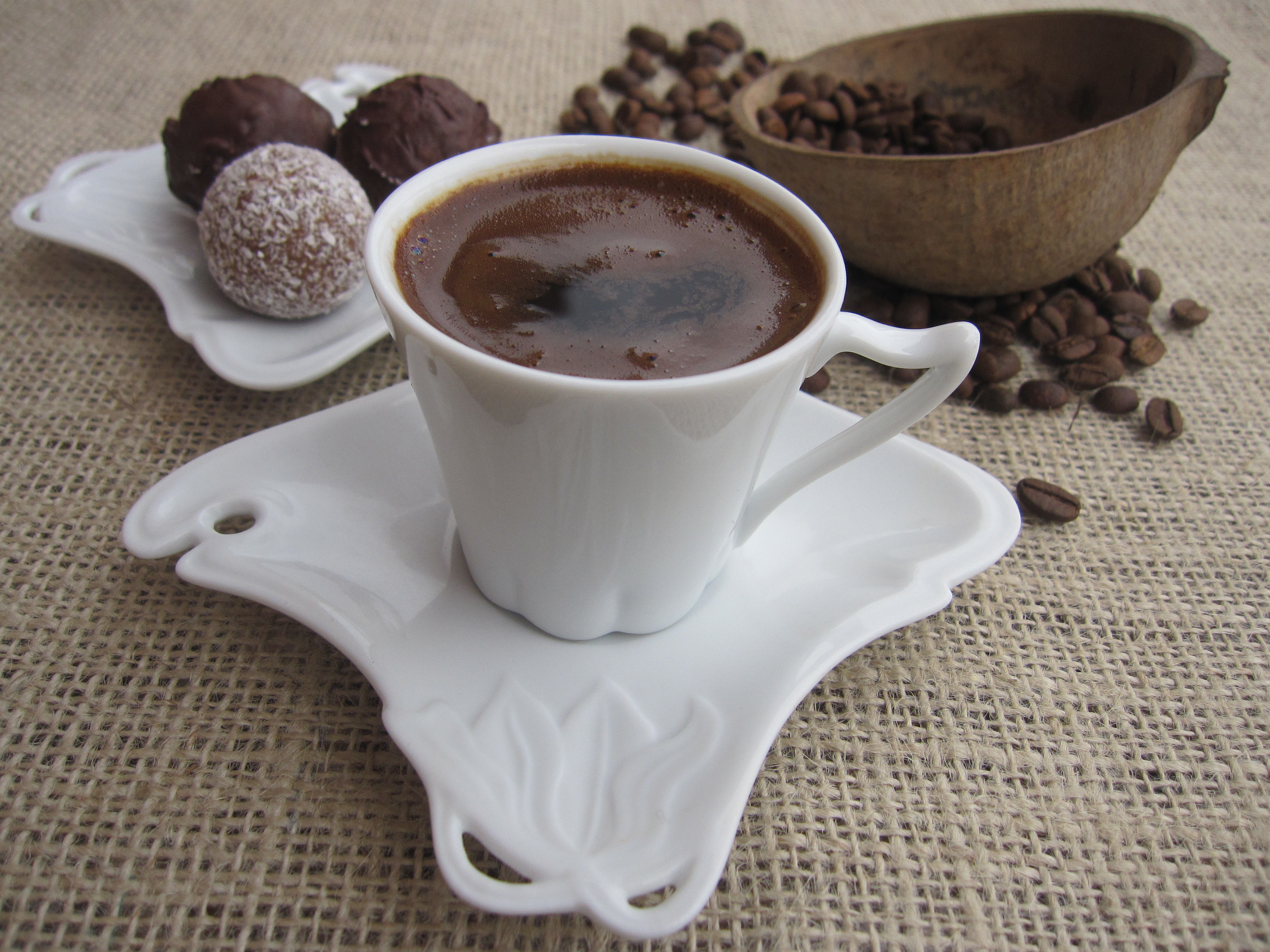 Kafe Turke, Albanian Turkish coffee brewed in a copper xhezve, served with sweets and coffee beans