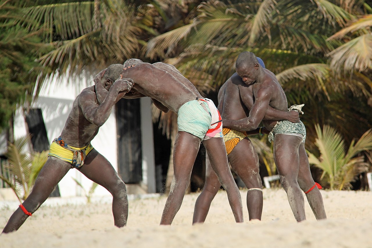 Traditional Gambian wrestlers on the beach