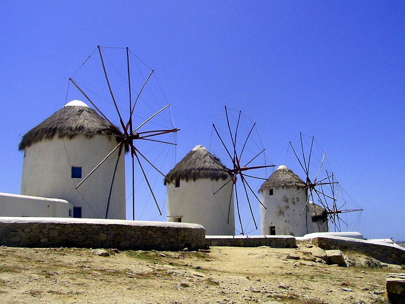 Iconic windmills of Mykonos island overlooking the Aegean Sea